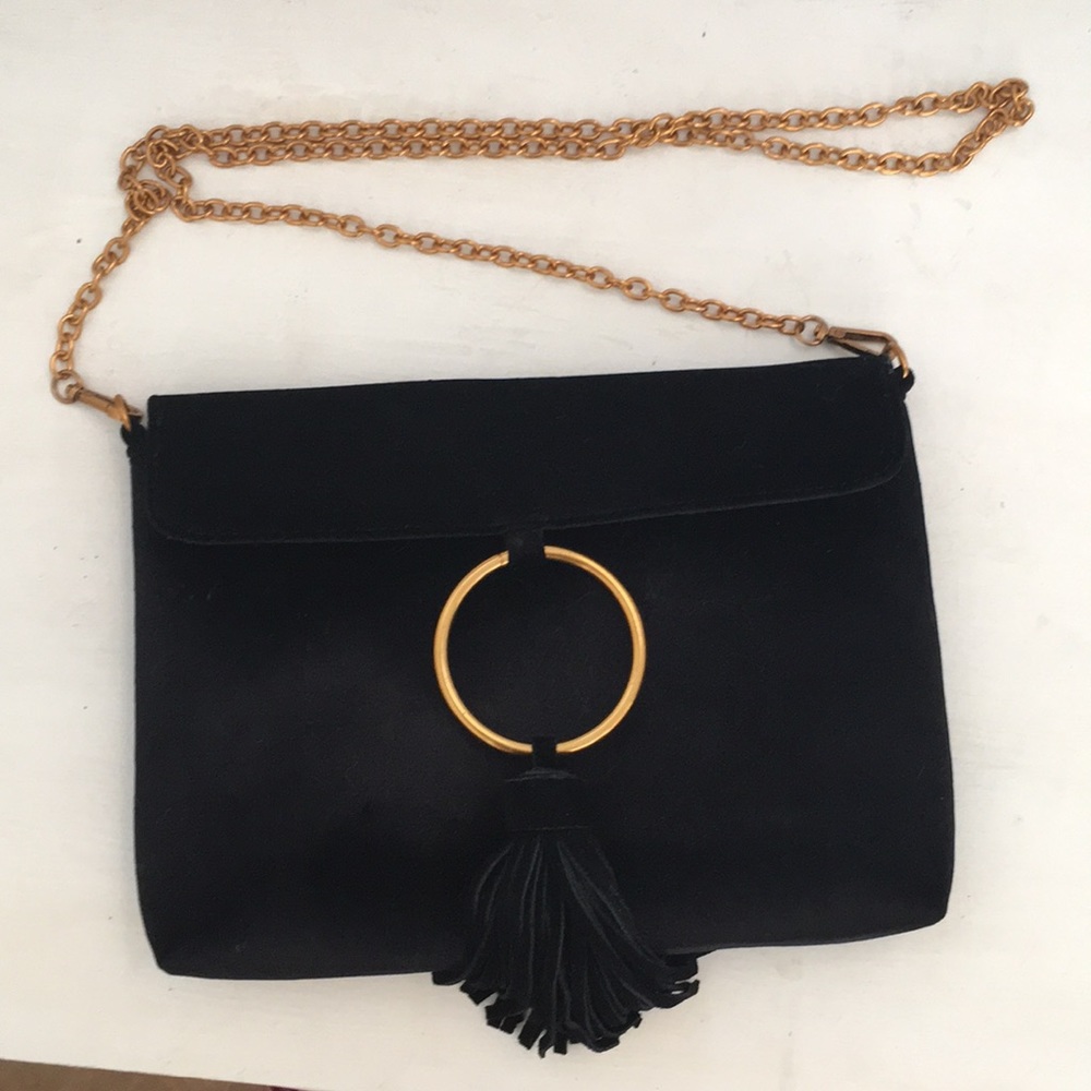 Velvet tassel clutch with gold hardware